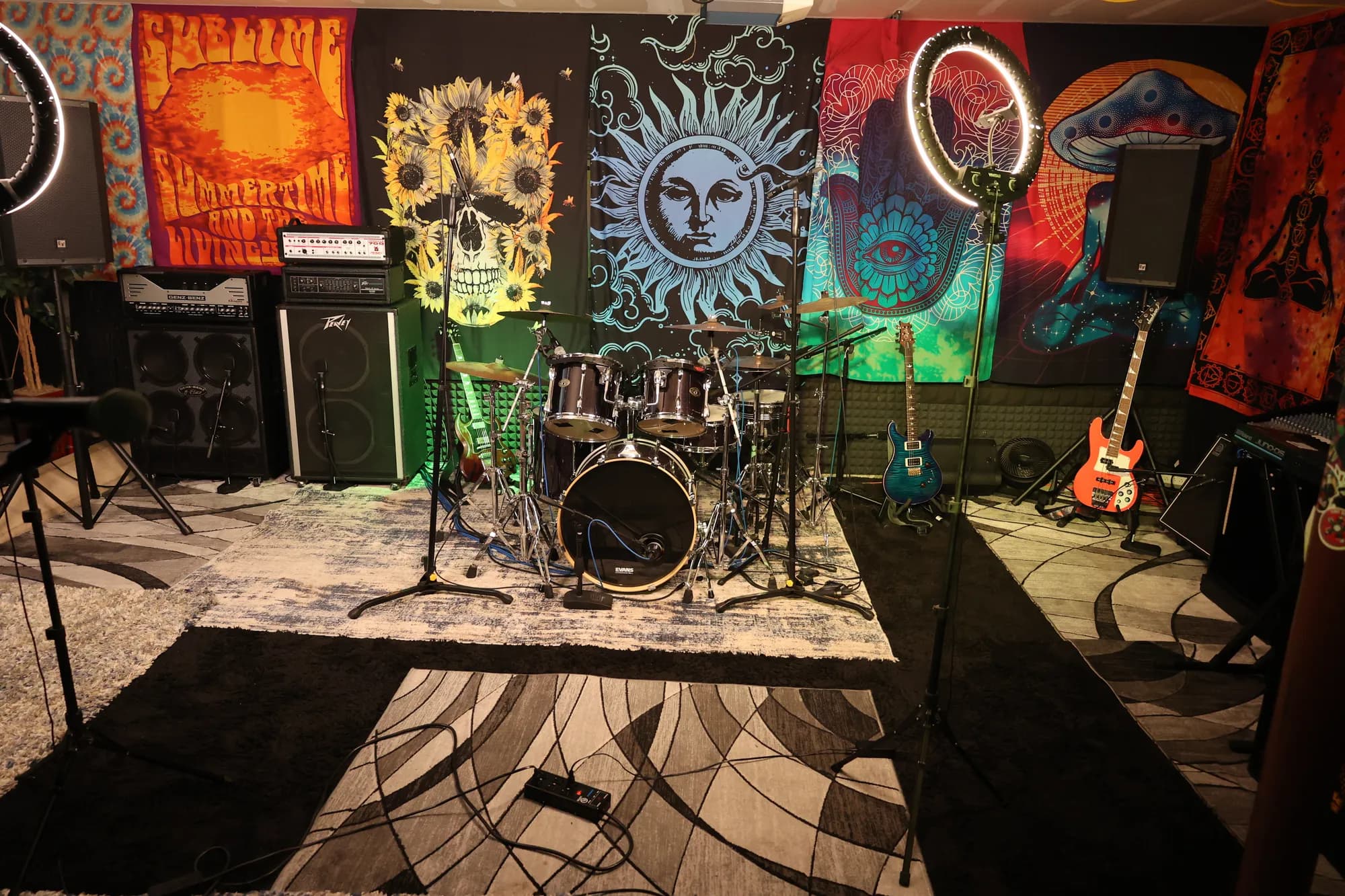 The Live Room at Certified Entertainment Studios, set up with a drum kit, backline, and stage lighting